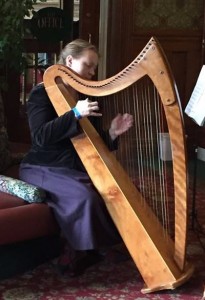 Alta Graham playing her celtic harp