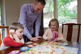 Family playing board games